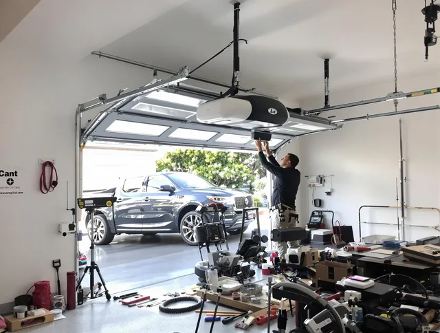 Streetsboro Garage Door Repair specialist installing smart garage door opener system in Streetsboro home