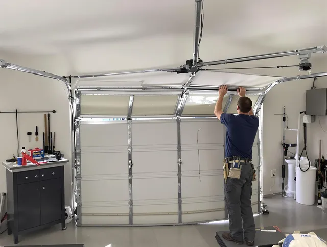 Streetsboro Garage Door Repair specialist performing precise section replacement on Streetsboro garage door